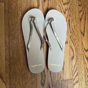 NWT Tory Burch metallic leather flip flops in spark gold